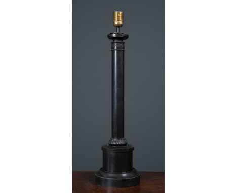 An ebonised turned column table lamp on circular base, 64.5cm high to the fittingCondition report: Small surface scratches to