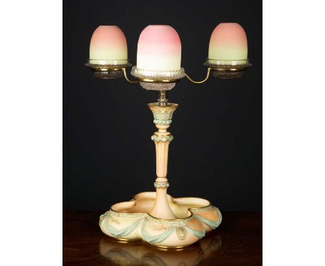 A Royal Worcester porcelain gilt brass and glass 'Cricklite' with three Webb Burmese night lights, marked beneath the lobed b