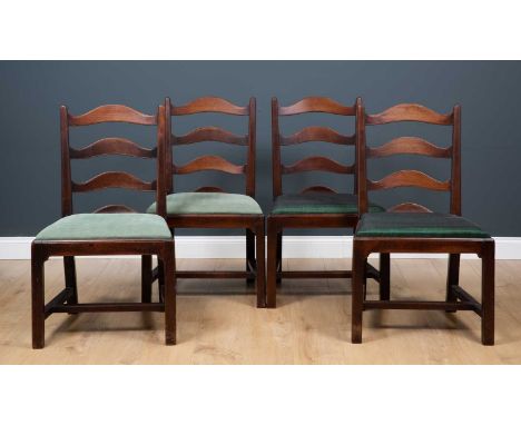 A set of four George III country made mahogany ladder back dining chairs of plain form with inset seats, on square legs unite