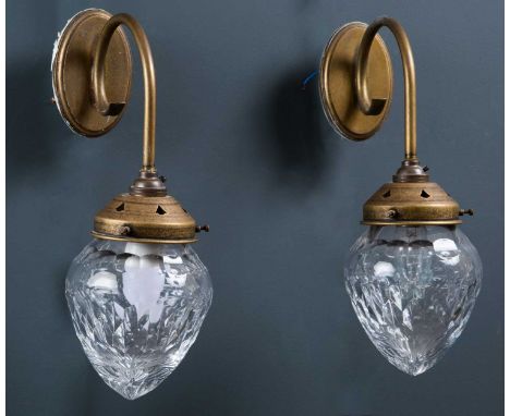 A pair of Jim Lawrence wall lights with cut glass shades, approximately 32cm high overall together with a matching hanging la