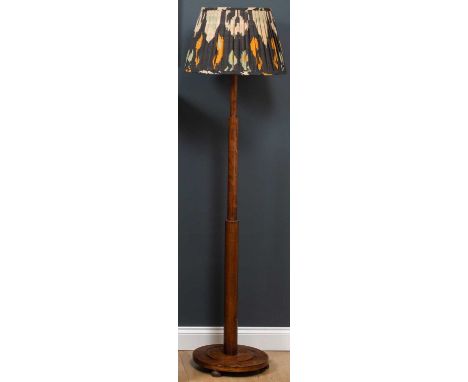 An early 20th century oak art deco lamp standard with stepped column and circular spreading base, complete with an art deco s