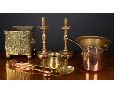 A brass capstan inkwell, 19cm diameter x 5cm high, together with further metalware comprising; a pair of turned brass candles