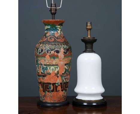 A 19th century white glass bodied table lamp possibly previously an oil lamp, with turned ebonised socle, 16cm diameter at th