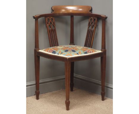 Art Nouveau mahogany inlaid corner chair, shaped cresting rail, pierced splat, square tapering supports with spade feet, upho