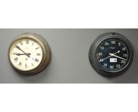 'Magneta Electric' circular electric slave clock, 'Synchronome' circular beech cased slave clock and two other slave clocks C