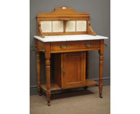 Edwardian marble top washstand, raised tiled back, single drawer, metal towel rail to the side, turned supports joined by an 