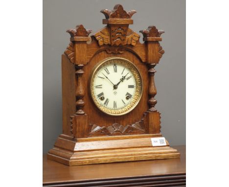 19th century oak architectural cased 'Ansonia Tivoli' mantel clock, 8-day movement with enamel dial, H38cm Condition Report C