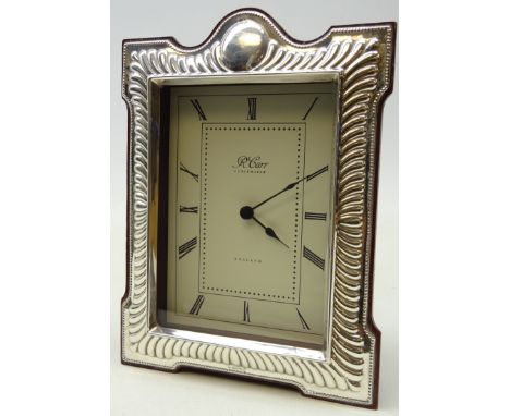 Silver fronted mantel clock with quartz movement by R. Carr, Sheffield, 1992, H19.5cm x W14.5cm  Condition Report Click here 