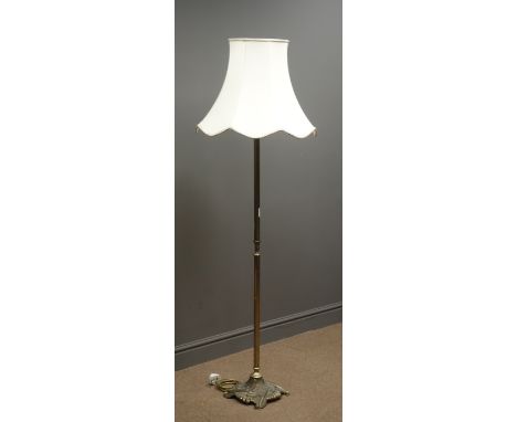 Cast metal standard lamp, reeded column, moulded base with paw feet, cream shade, H133cm (This item is PAT tested - 5 day war