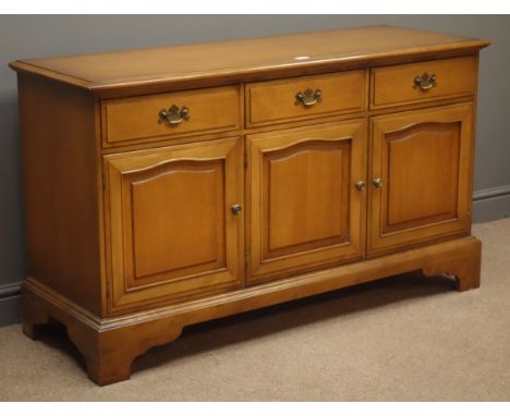 Stag Beech sideboard, three drawers above three cupboards on bracket feet, W134cm, H78cm, D47cm Condition Report Click here f