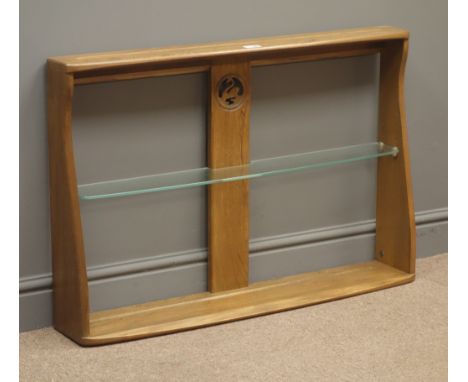 Ercol wall rack, centre support with carved and pierced swan, single glass shelf, W92cm, H62cm, D18cm Condition Report Click 