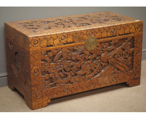 Heavily carved Eastern chest with wildlife and foliage, camphor wood lining on bracket supports, W103cm, H58cm, D53cm Conditi