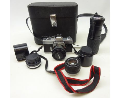 Minolta SRT101B 35mm camera with Minolta MC Rokkor PF 50mm lens, other lenses and Auto Tele Converter in carrying case Condit