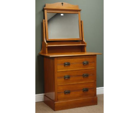 Edwardian walnut dressing chest, raised back with shaped and pierced pediment above mirror and shelf, three drawers, plinth b