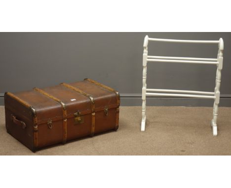 Early 20th century travelling trunk, hinged lid, securing clasps, dark red and wood finish, (W77cm, H35cm, D53cm), and a towe