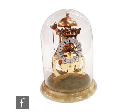 A late 20th Century skeleton mantle clock by Thwaites and Reed, hammer strike to a bell, in glass dome on green onyx base, he