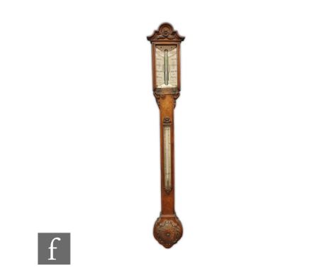 A late 19th Century figured and carved walnut stick barometer by Field &amp; Son, New Street, Birmingham, incorporating a the