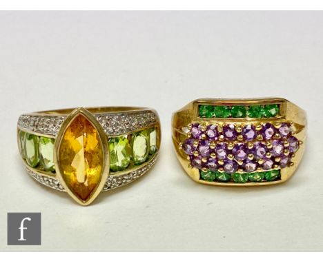 A 9ct amethyst and tsavorite ring set with three central rows of amethyst, with a peridot and citrene ring, central marquise 