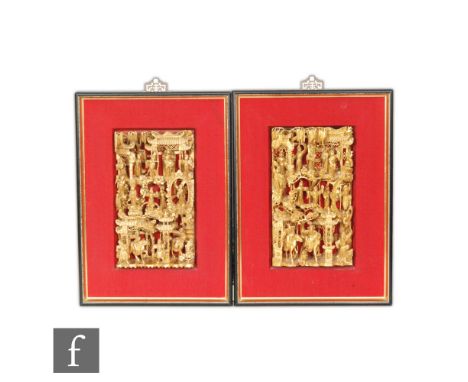 A pair of Chinese late Qing Dynasty (1644-1912) Republic period (1912-49) carved and gilt painted panels, pierced decoration 