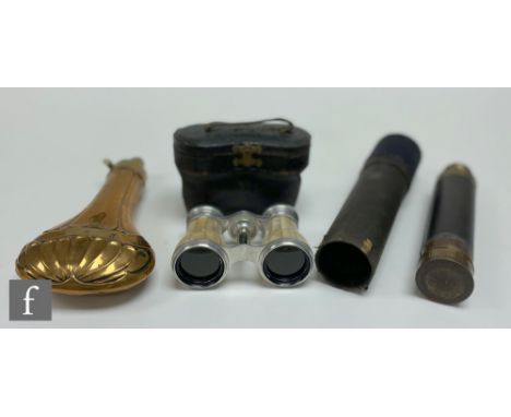 A small late 19th Century brass three drawer telescope, 44cm opened, a copper powder flask and a pair of mother or pearl oper