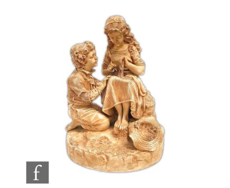 A 19th Century Robinson and Leadbetter Vellum range figure of a young girl sat mending a piece of lace with a young boy kneel