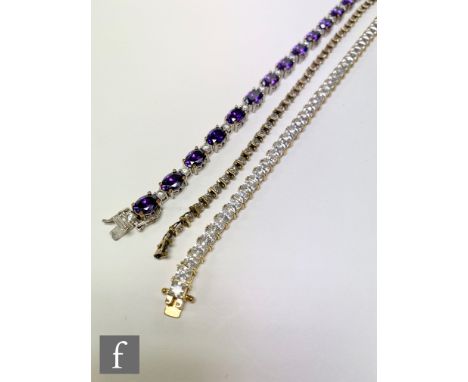 A 9ct hallmarked diamond set flexible tennis bracelet, weight 6g, with a silver and cubic zirconia and a further amethyst and