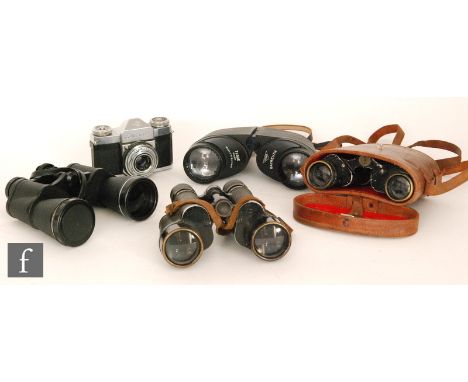 A pair of Steiner Bayreuth 7X50E binoculars, a pair of Carl Zeiss Jena binoculars, two other pairs, a camera and a tripod. (6