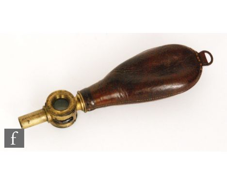 A 19th Century French leather shot flask with oval pounch mounted with a brass hinged measure with central glass windowed com