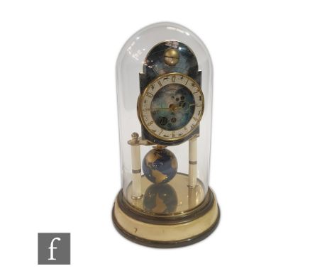 A 20th Century 'Kaiser' 365 day moon face mantle clock in glass dome with sphere pendulum on painted stepped base, height 28c