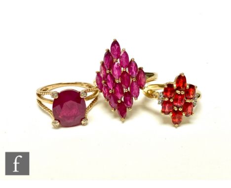 Three 9ct hallmarked red stone rings to include a ruby single stone and a multi stone marquise shaped ring, total weight 9.8g