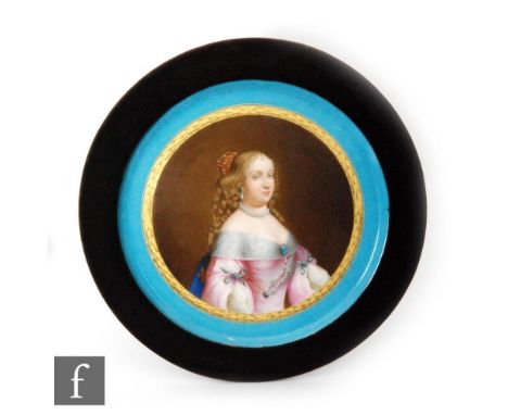 A large framed Sevres circular plaque hand painted with a portrait of Marie-Thérèse d'Autriche (1638 - 1683) after the origin
