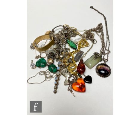 A small parcel lot of silver and other jewellery items to include chains, pendants, a bangle etc. 