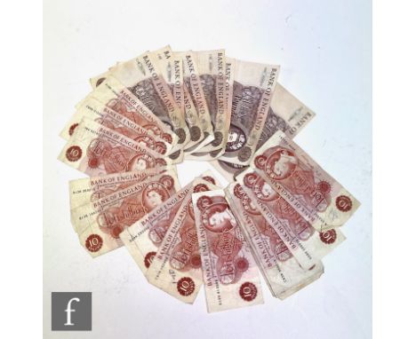Fifteen ten shilling notes and nine series C portrait issue ten pound notes, prefixes A, B and C. (24) 