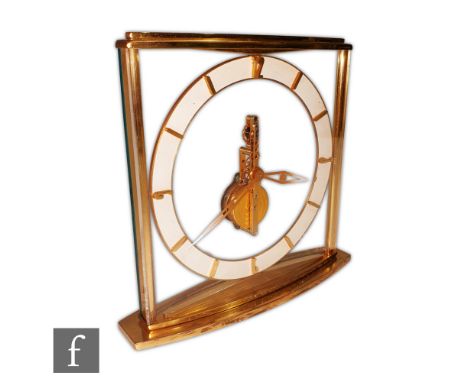 A Jaeger-Le Coultre style mantle clock with visual jewel and skeleton movement, unsigned, gilt metal and perspex case, in lig