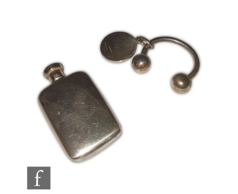 Two item of Sterling silver a horseshoe shaped key ring and a small cushioned rectangular scent bottle length 4.5cm, both sta