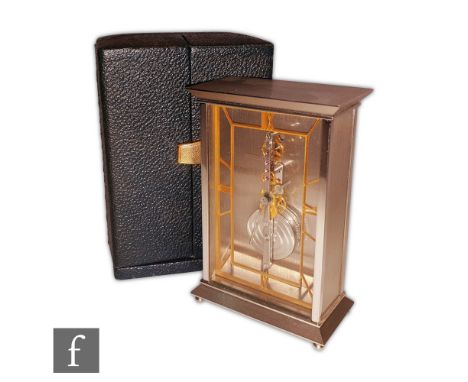 A Jaegar-Le Coultre inline skeleton mantle or desk clock, visible jeweled movement and gilded open Roman numeral dial in cant