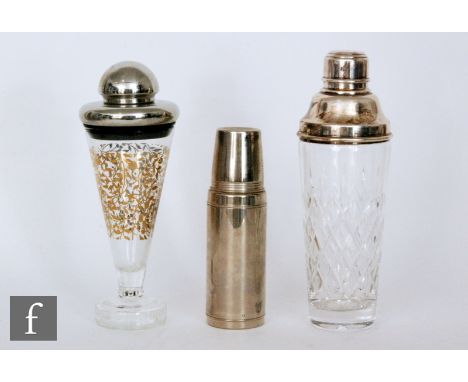 A large early 20th Century clear cut crystal cocktail shaker with a repeat diamond pattern beneath a chrome plated cover, hei