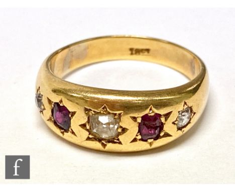 An 18ct gold gentleman's diamond and ruby gypsy set ring, five alternating stones, stamped 18ct, weight 10g,  ring size W. S/