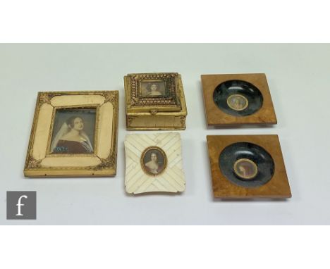 An early 20th century gilt trinket box inset with an oval photograph of a young girl, a pair of burr walnut miniatures and tw
