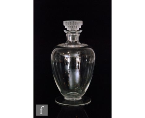 A 1930s Rene Lalique clear crystal decanter in the Bambou pattern, of footed shouldered ovoid form with shallow collar neck a