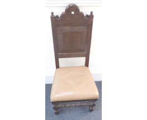 A set of eight reproduction 17th century style oak dining chairs, including two elbow chairs, with raised and fielded panel b