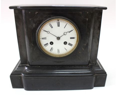 A Victorian black marble mantel clock, the white enamel dial with Roman numerals, the 8 day movement stamped 'Barrard & Vigno