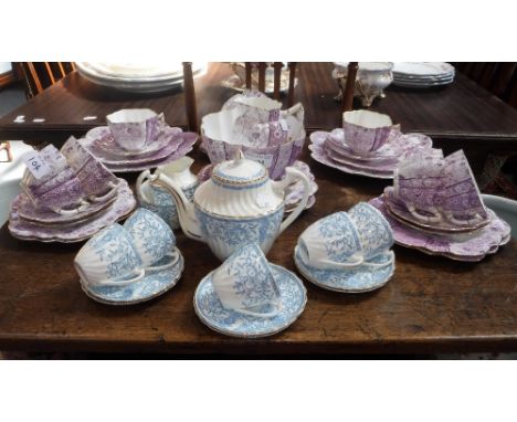 A WILEMAN & CO (LATER SHELLEY) PINK AND GILT DECORATED TEASET and a similar blue teaset with matching teapot