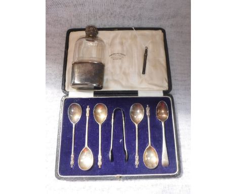 A SET OF FIVE SILVER APOSTLE TEASPOONS, ANOTHER SILVER SPOON, and tongs, in a fitted presentation case, a silver propelling p