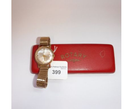 A GENTLEMAN'S 9CT YELLOW GOLD WRISTWATCH, the round dial with button numerals, date aperture and sweep second hand, inscribed