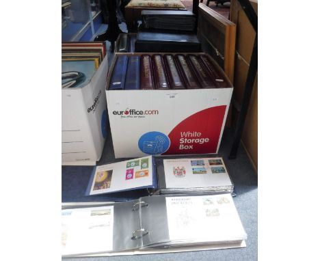 A LARGE COLLECTION OF FIRST DAY COVERS in albums (2 boxes)