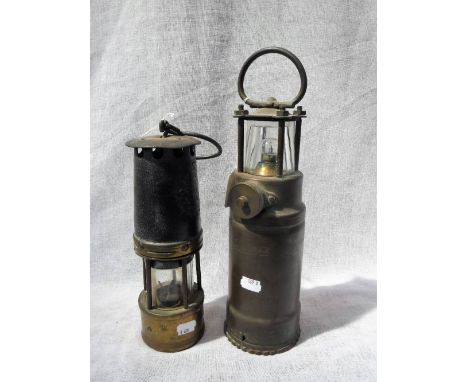 A BRASS MINER'S LAMP and a Vintage Oldham brass hand lamp (2)