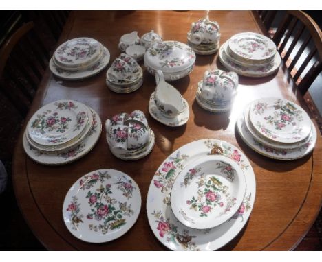 A WEDGWOOD "CHARNWOOD" DINNER AND TEA SERVICE