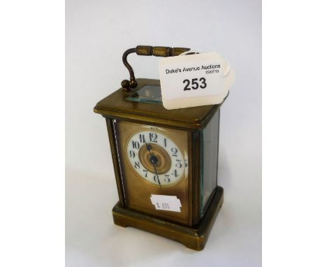 AN EDWARDIAN BRASS CASED CARRIAGE CLOCK, 12 cm high