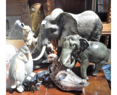 A LARGE CERAMIC STUDY OF AN ELEPHANT, a Peggy Davies study of otters and similar animals
